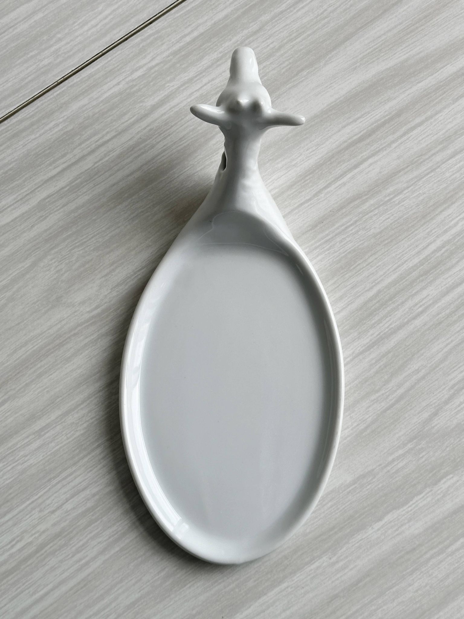 Avignon white porcelain dish in the shape of a goat.