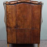 Fauteuil à oreilles en cuir de mouton