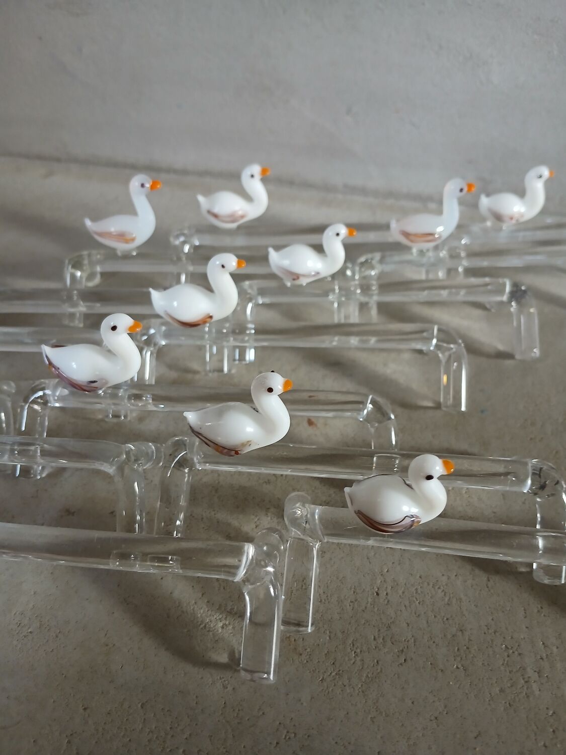 14 antique glass knife rests / ducks