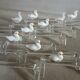 14 antique glass knife rests / ducks