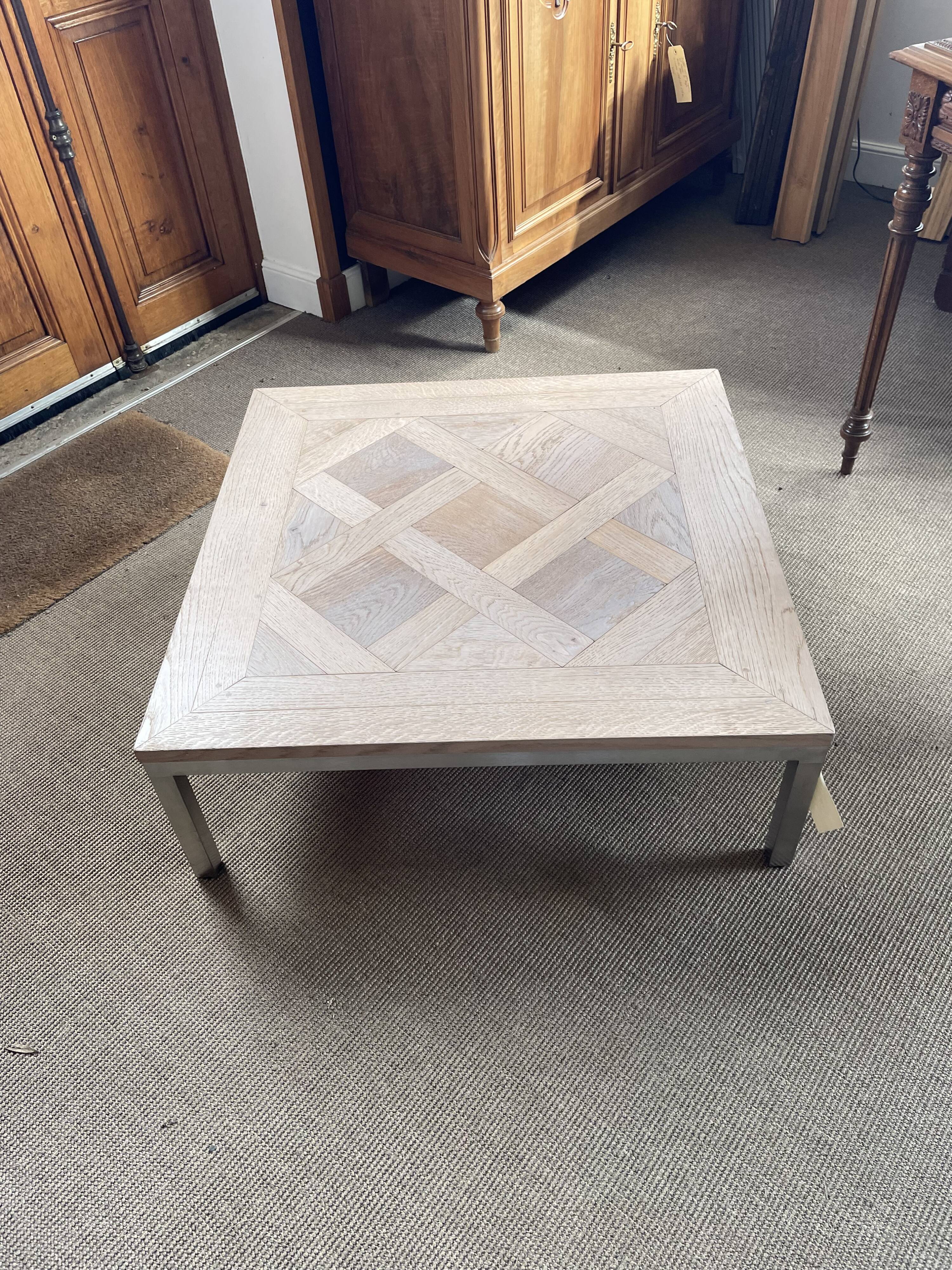 Square coffee table – Oak parquet Versailles pattern – Stainless steel base