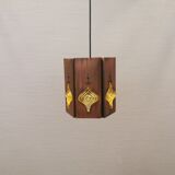 Older hanging lamp, made of metal with yellow prisms.