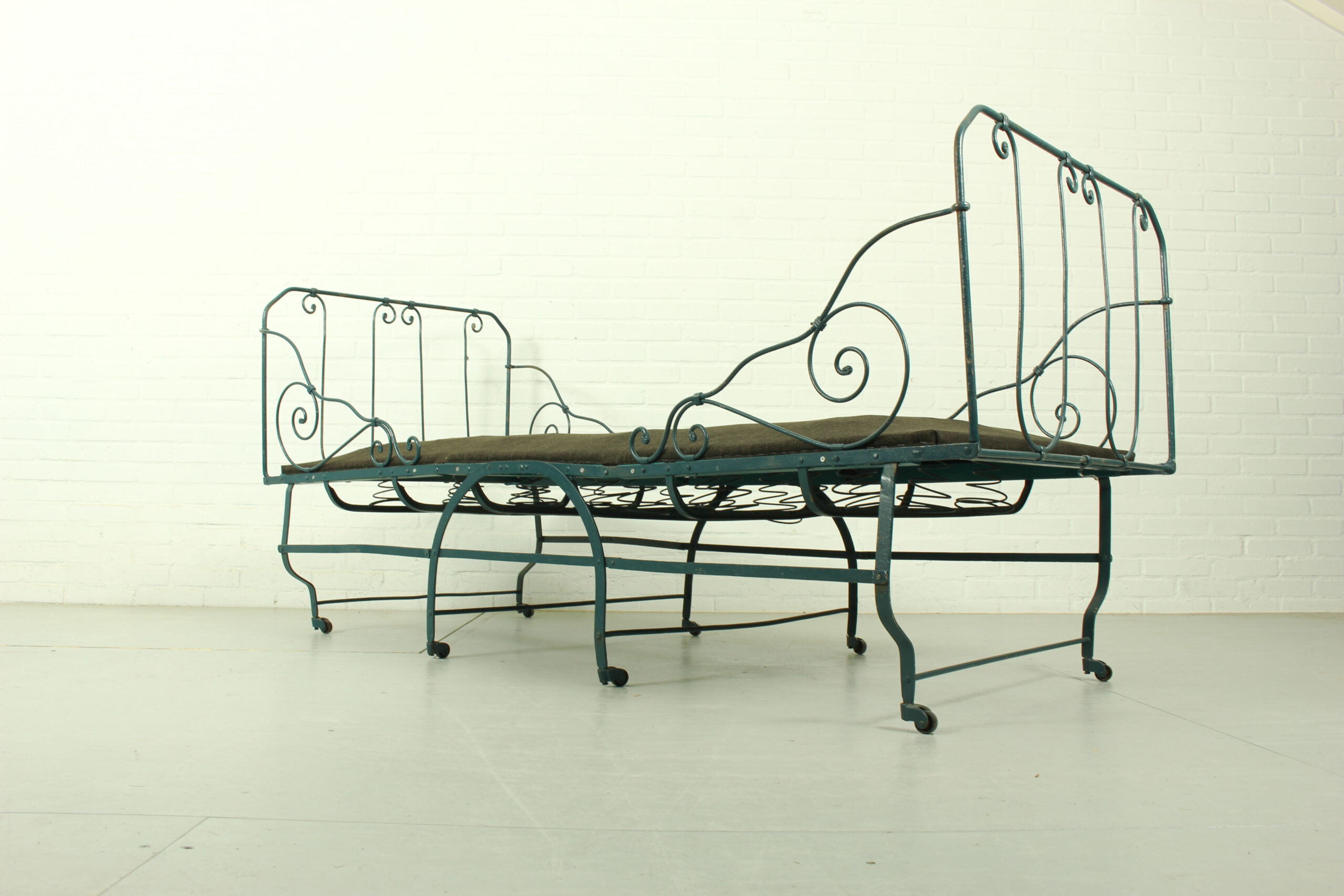 Foldable metal daybed with new webbing and upholstery