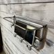 Aluminum wall-mounted coat rack with mirror