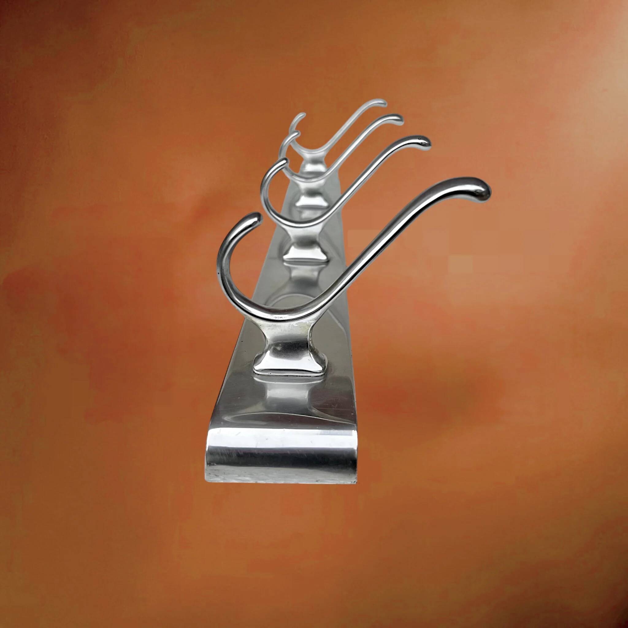 Wall-mounted coat rack in anodised aluminium with 4 hooks, modernist design - 1970s