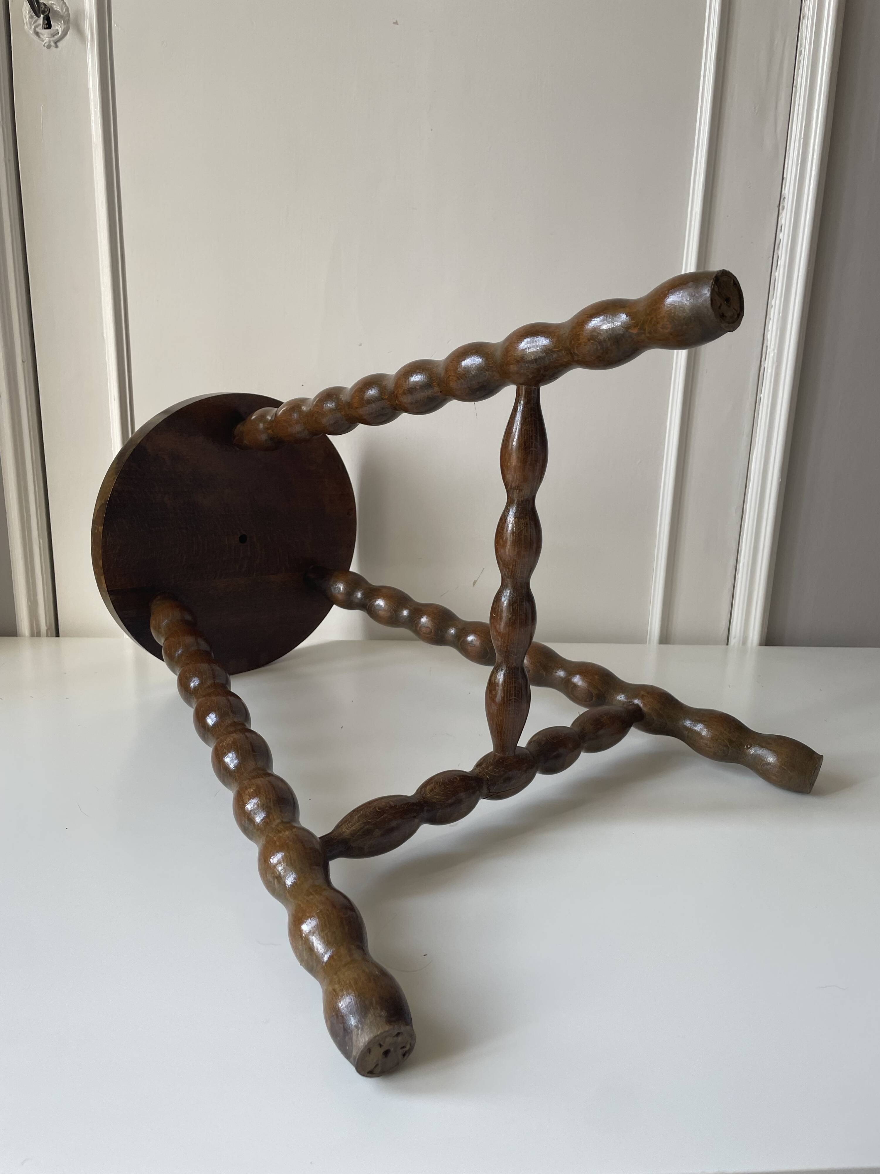 Wooden tripod stool