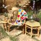 Set of three vintage rattan side tables.