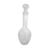 Old glass decanter with cap