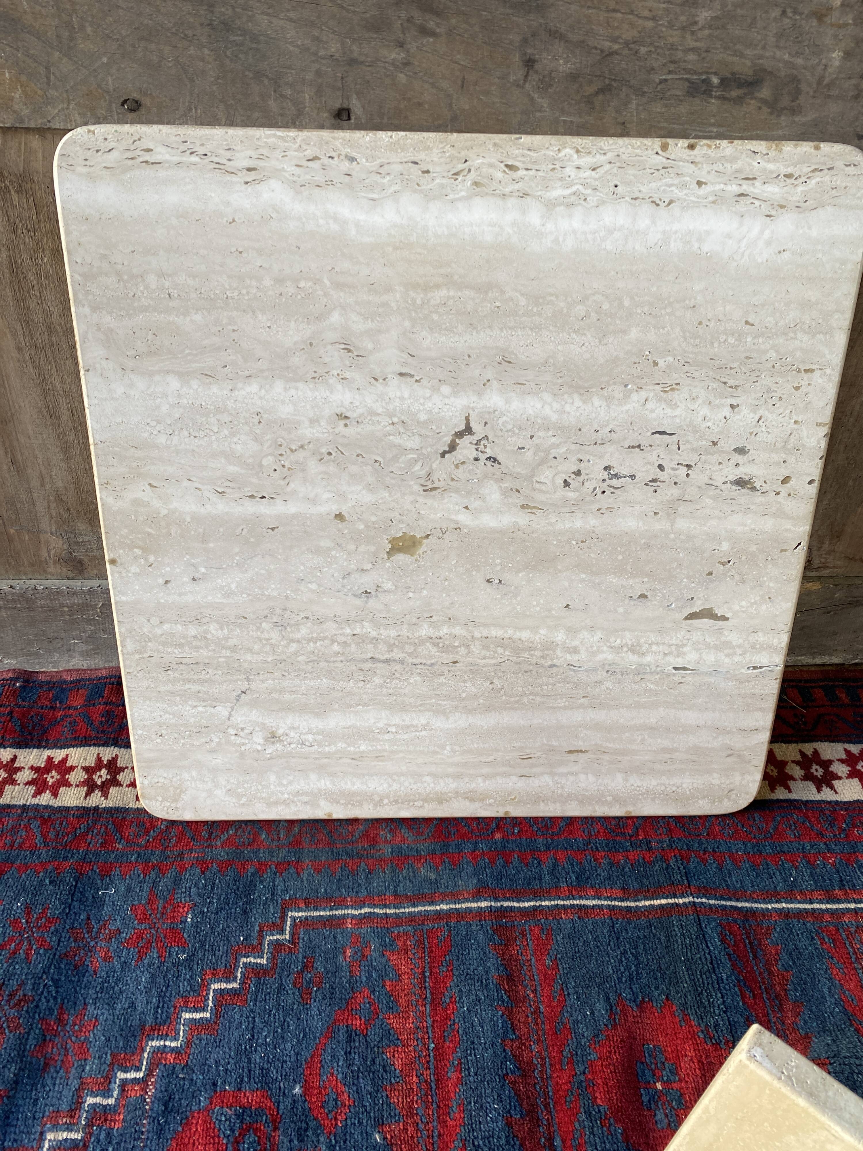 Coffee table in travertine