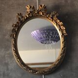 Oval golden mirror