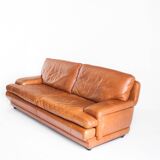 Vintage three-seater leather sofa. Edition by Roche Bobois. France, 70s-80s