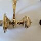 Duo of brass balance wall candle holders
