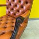 Vintage orange leather buttoned back gainsborough swivel desk chair from 1980