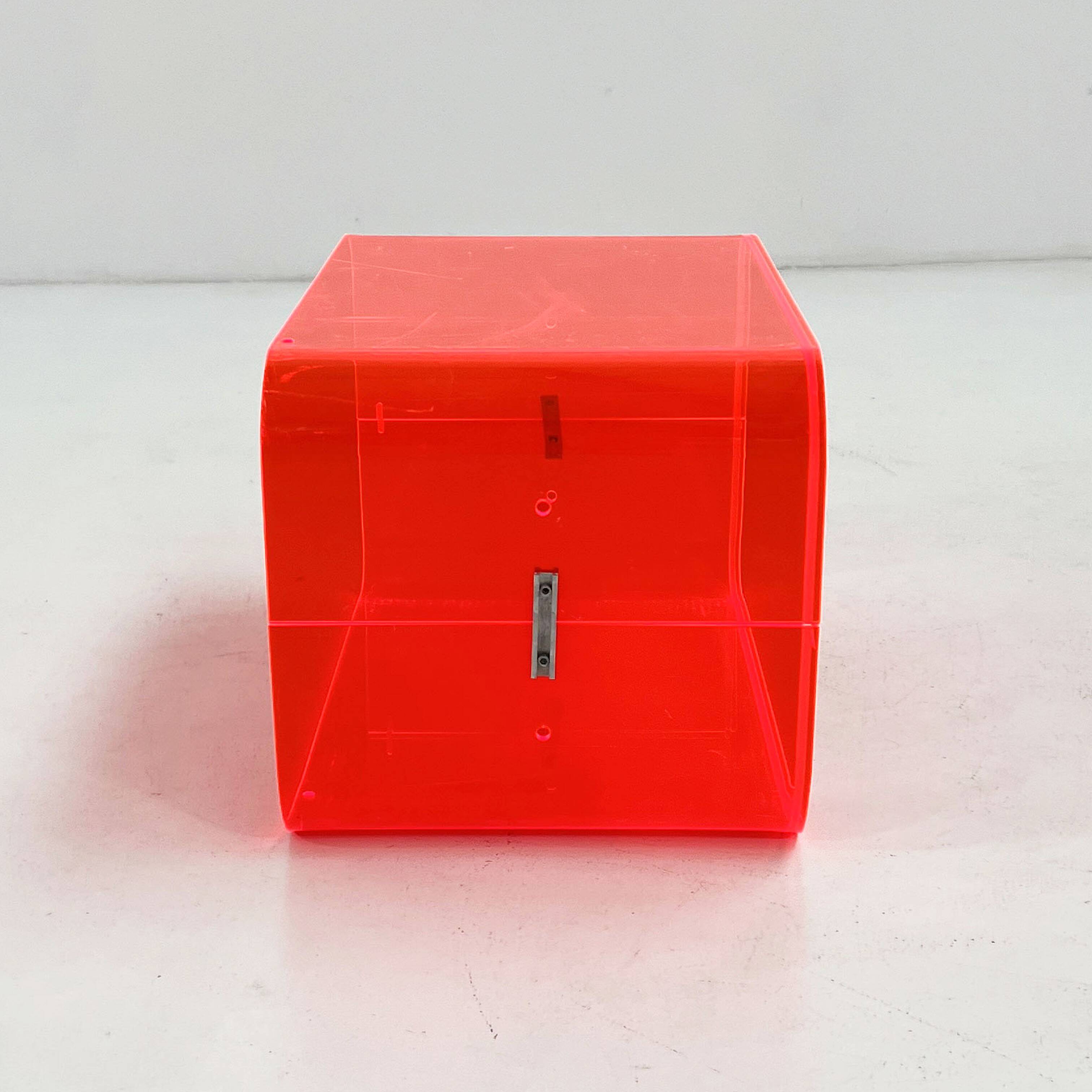 Fluorescent pink plexiglass coffee table, 1980.