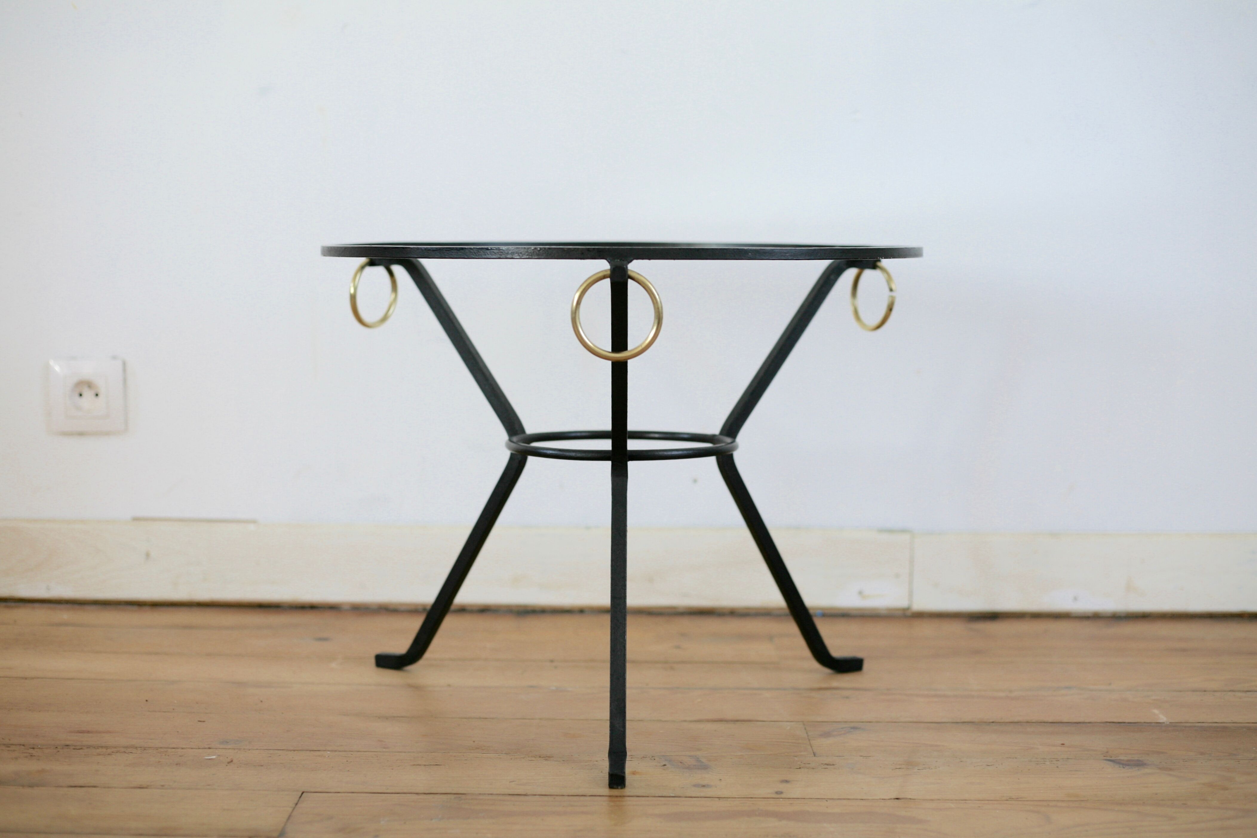 Coffee table black lacquered metal, glass and brass, France, circa 1950.