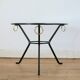 Coffee table black lacquered metal, glass and brass, France, circa 1950.