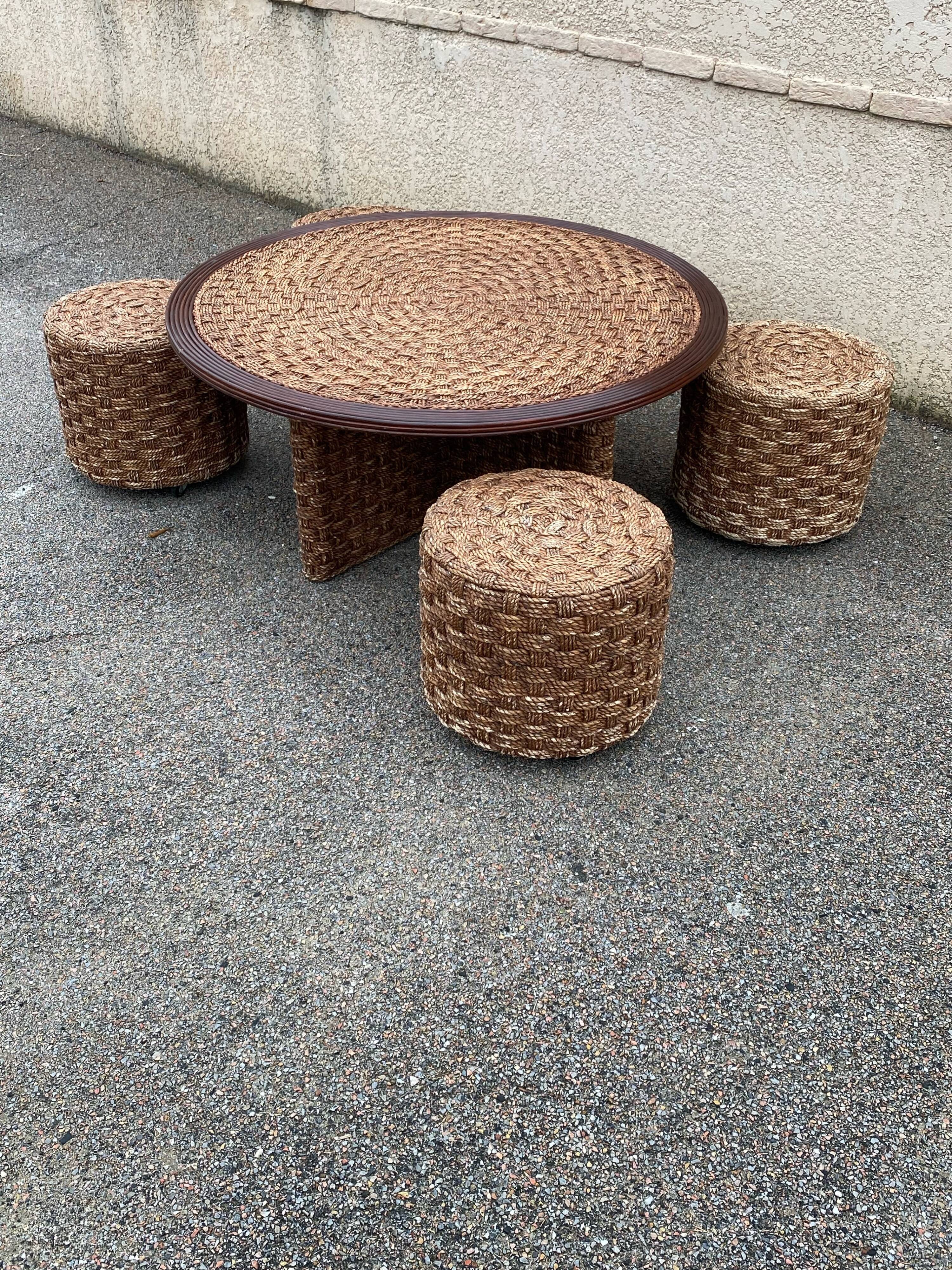 A coffee table and four rope stools 1960/1970