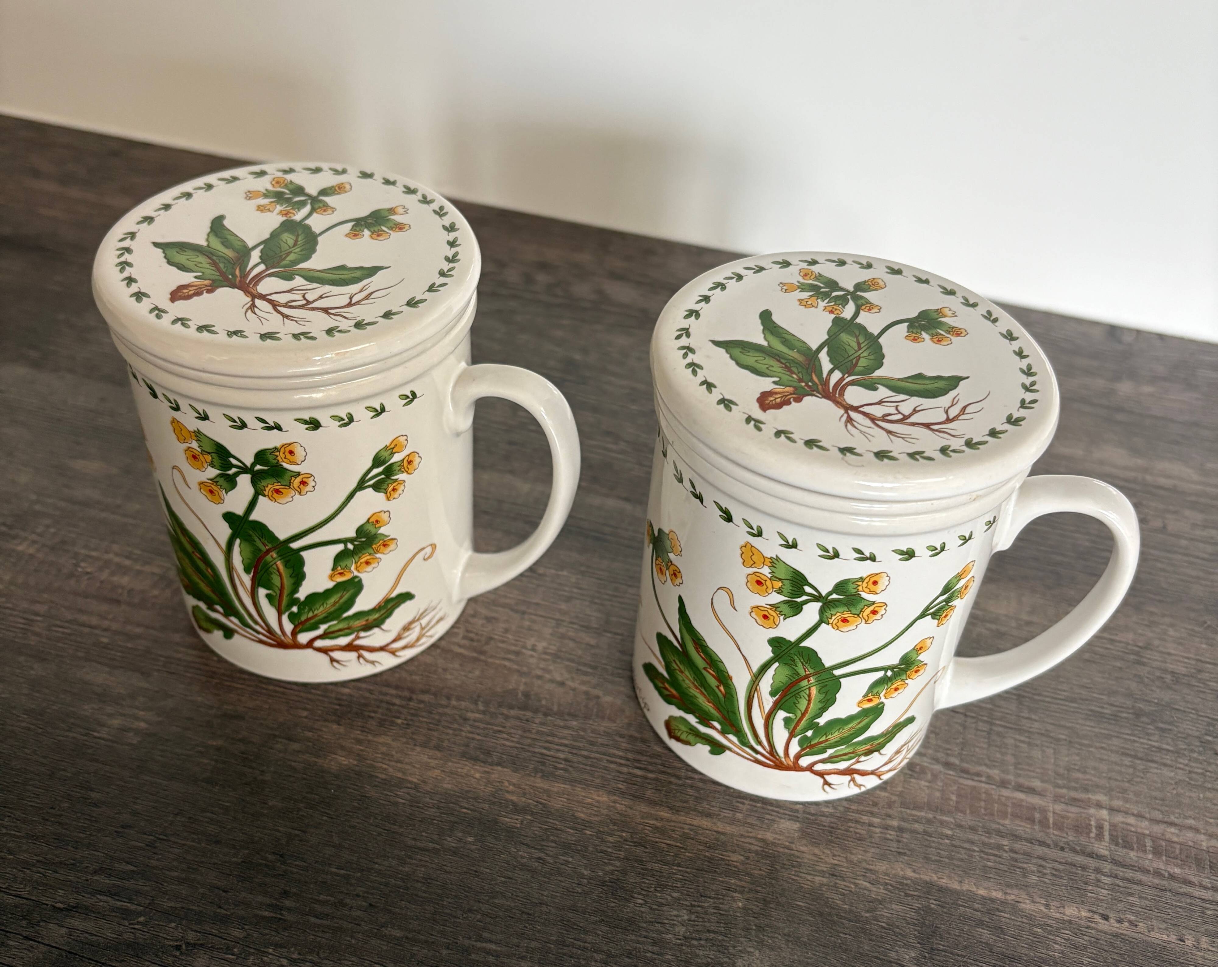 Pair of vintage infusion mugs.