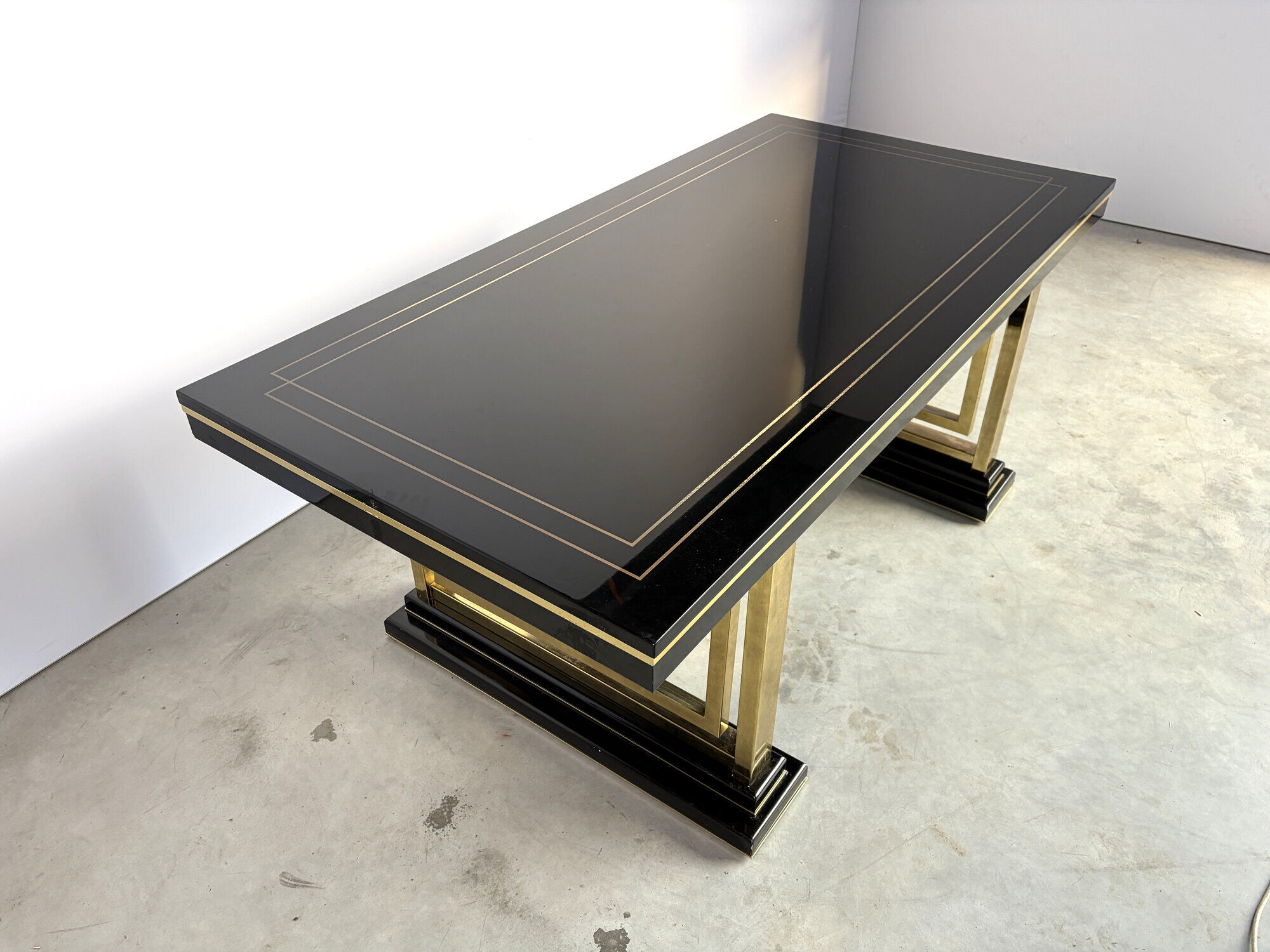 Vintage lacquer and brass dining table, 1970s