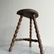 Tripod stool with turned wooden legs