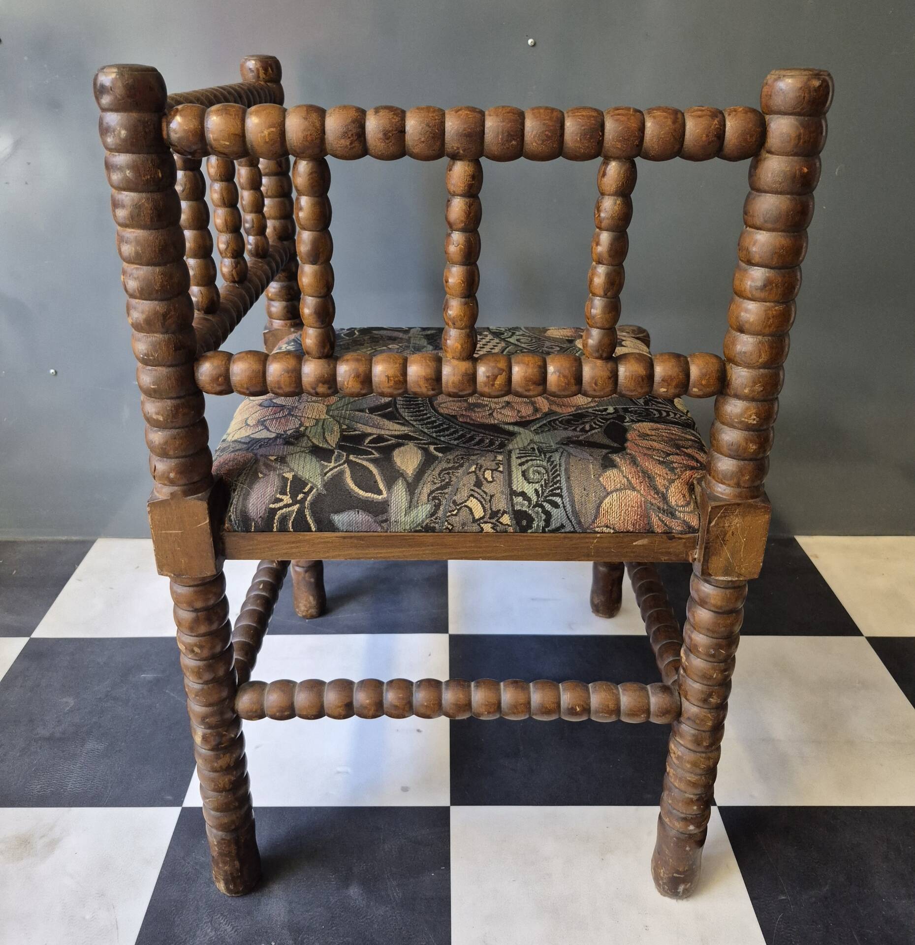 Old pair of corner chairs known as 'fireplace corner' armchairs.