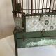 Octagonal bird cage made of wood and wire around 1920