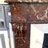 Louis Philippe style fireplace in speckled red marble 20th century