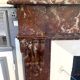 Louis Philippe style fireplace in speckled red marble 20th century