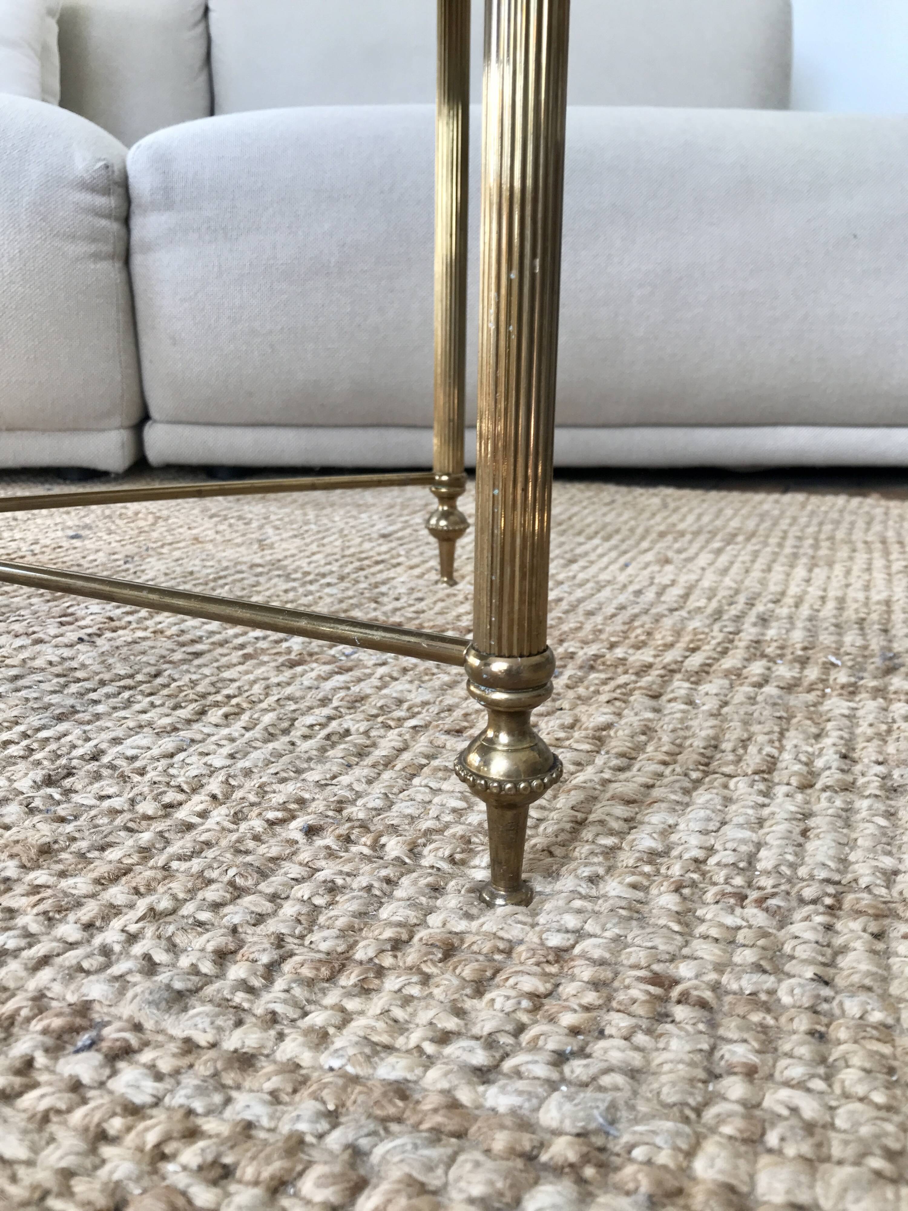 Coffee table in brass and green marble