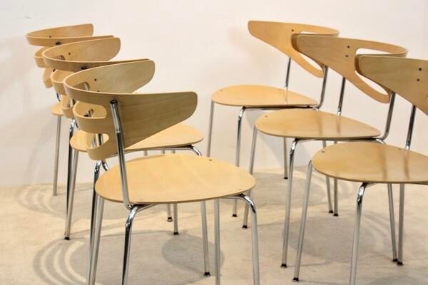 Thonet curved dining chairs stacked in chrome and beech
