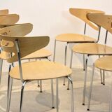 Thonet curved dining chairs stacked in chrome and beech