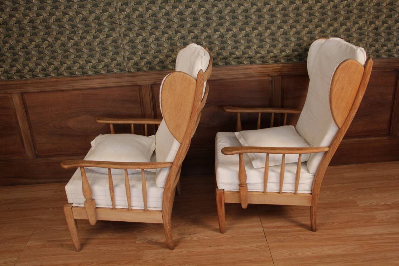 Pair of armchairs with ears of the 50s in oak