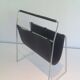 Chrome and black leather magazine rack