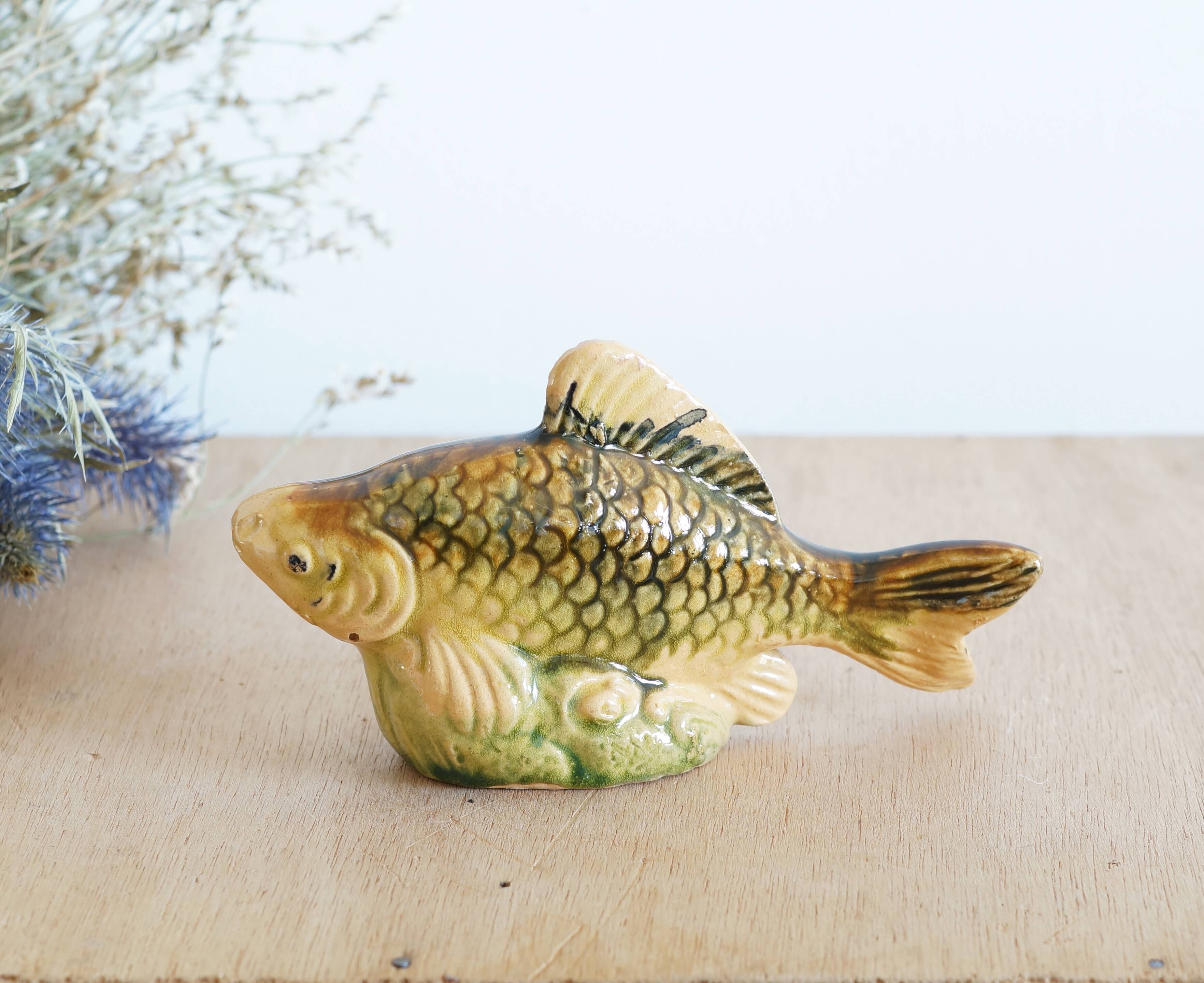 Small earthenware fish figurine
