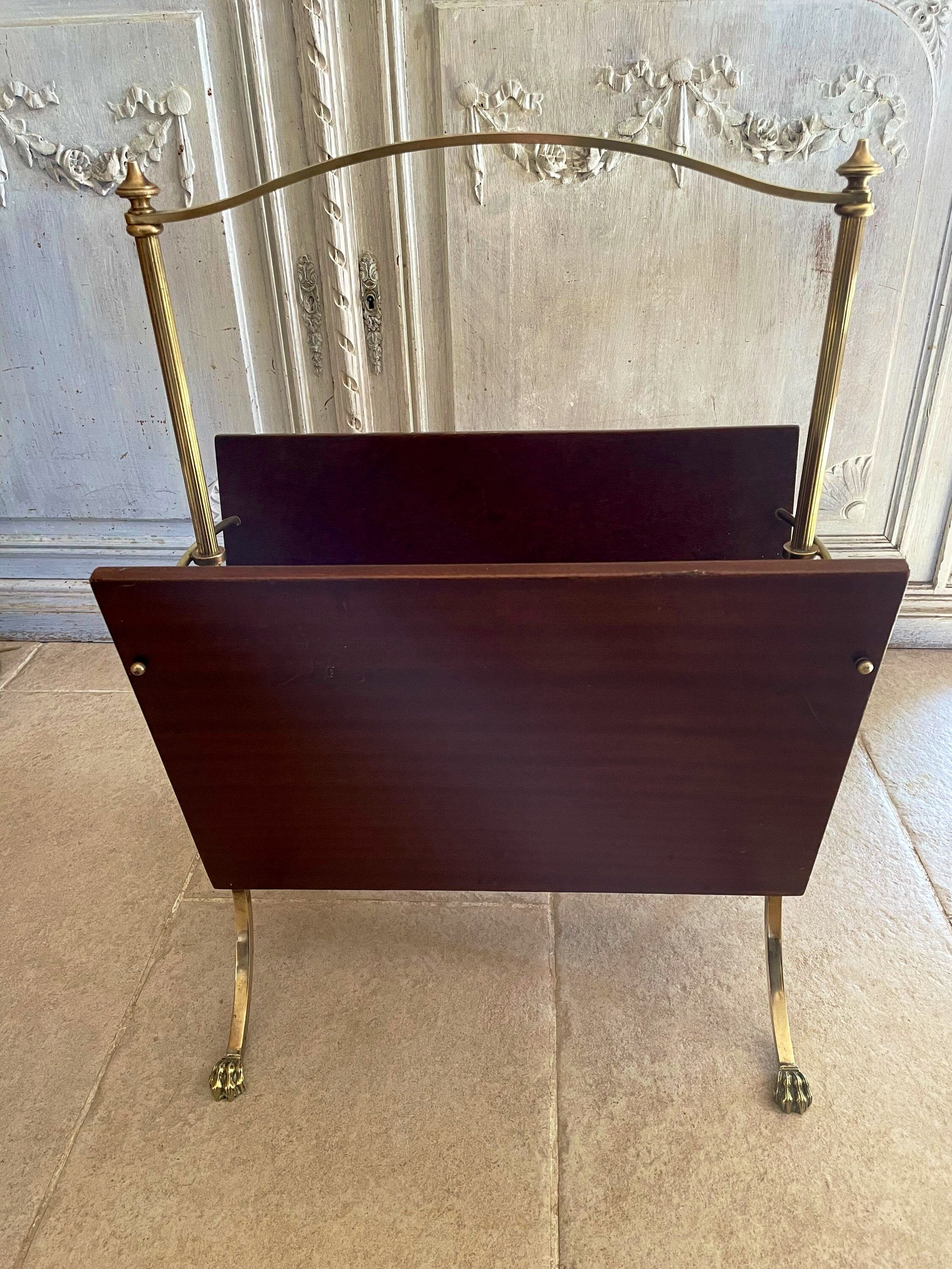 Magazine racks with claw feet by Maison Jansen