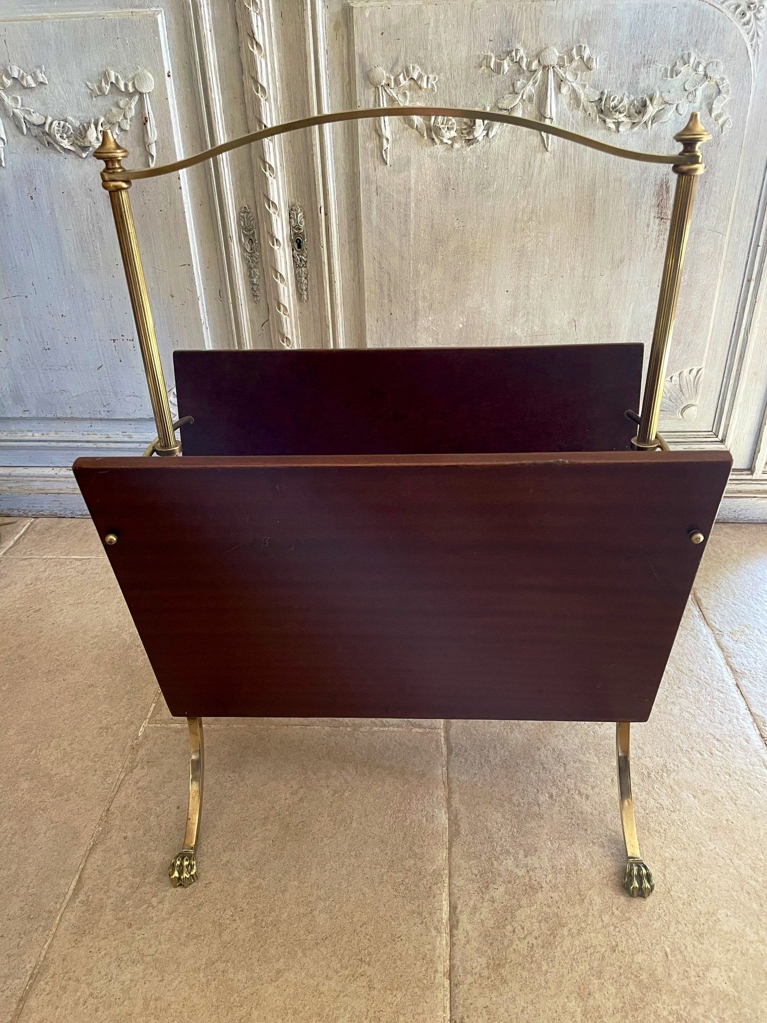 Magazine racks with claw feet by Maison Jansen