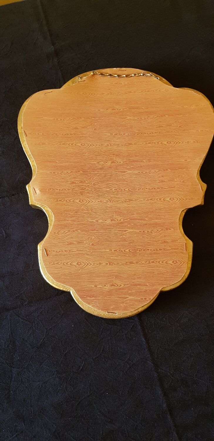 Louis XV style mirror in gilded wood.