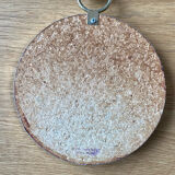 Vintage witch's eye curved mirror hangs velvet ribbon