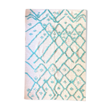 Berber cream carpet with blue pattern