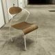 Atypical chair of the 70s metal and wood