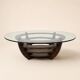 Sculptural coffee table with concentric rings, glass and wood, circa 1985.