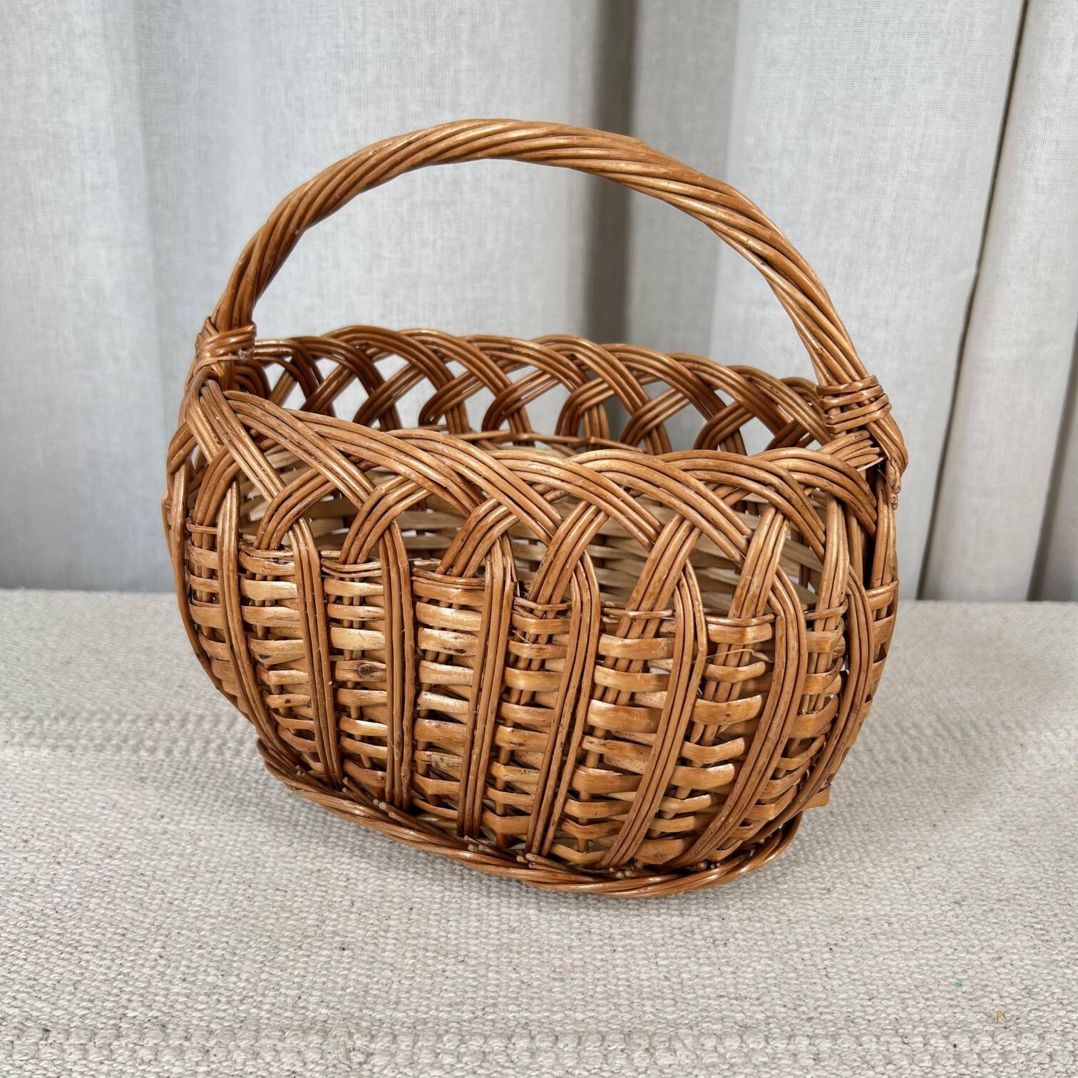Small oval woven wicker basket