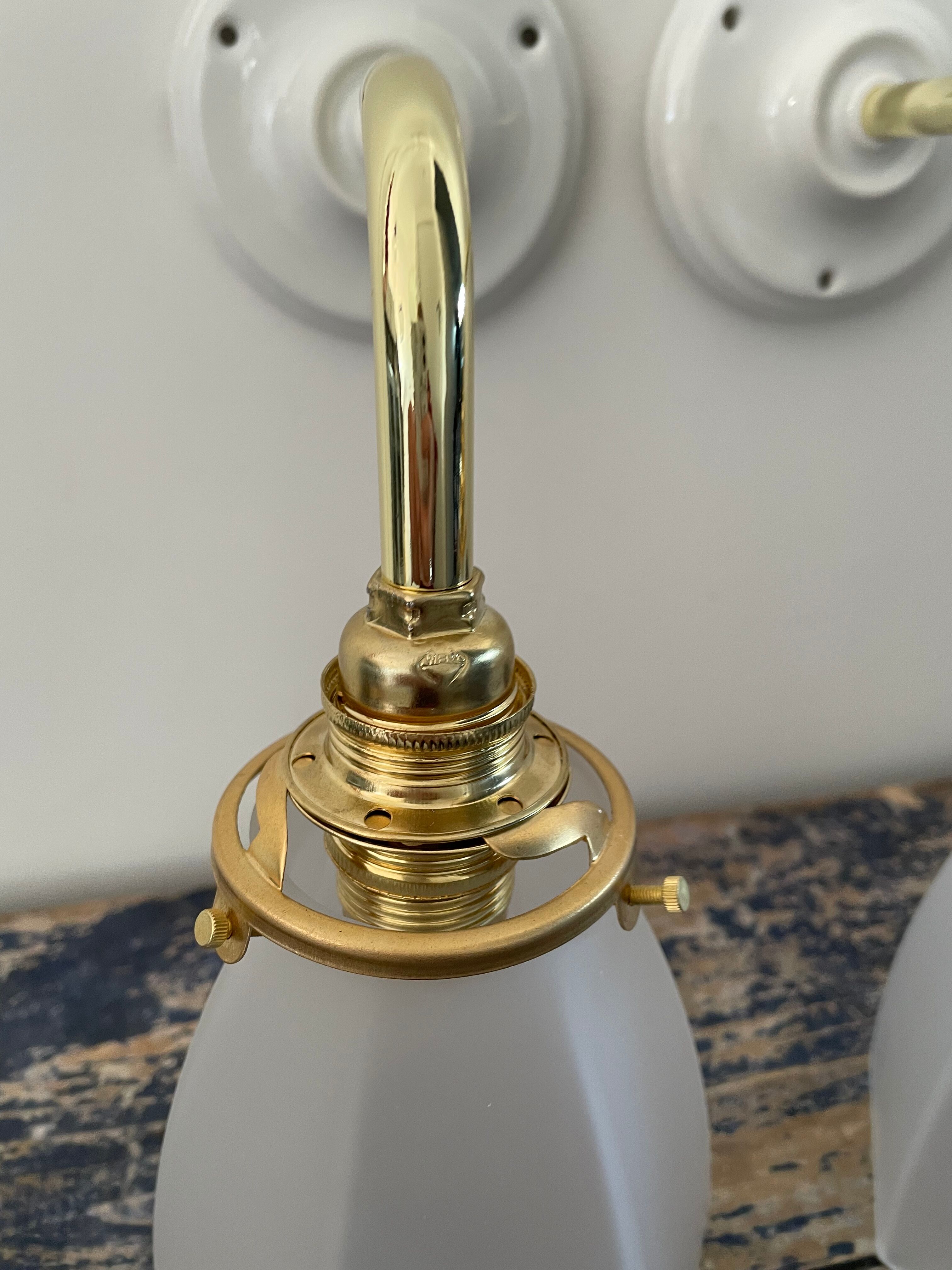 Set of two art deco wall lamps electrified to nine