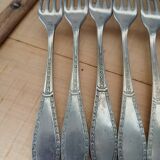 Antique cutlery set for 22 place settings