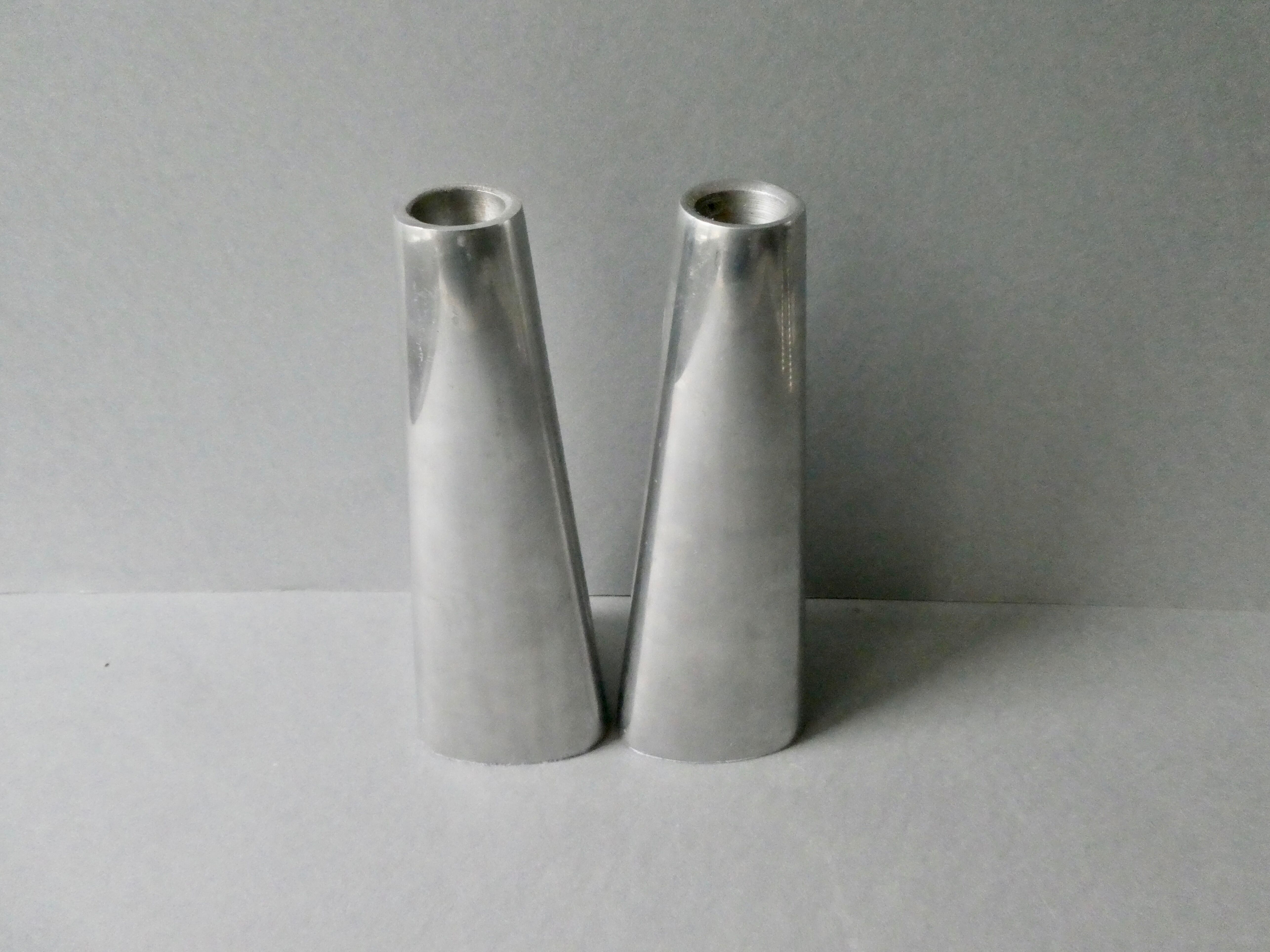 Pair of aluminum candle holders from the 80s