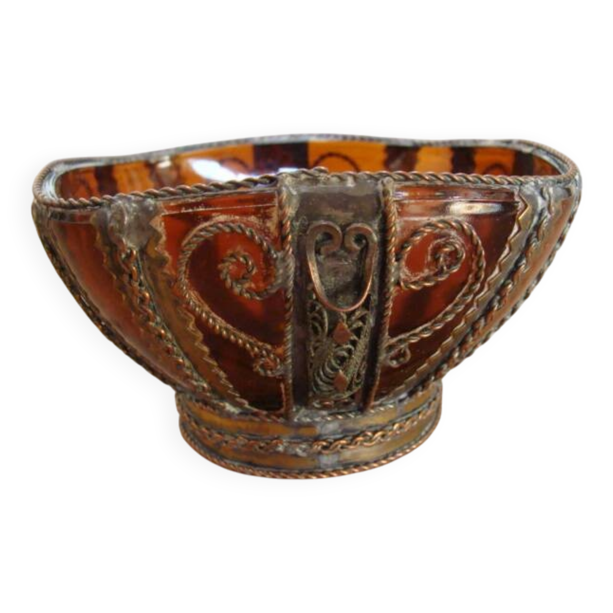 Small glass cup in metal frame