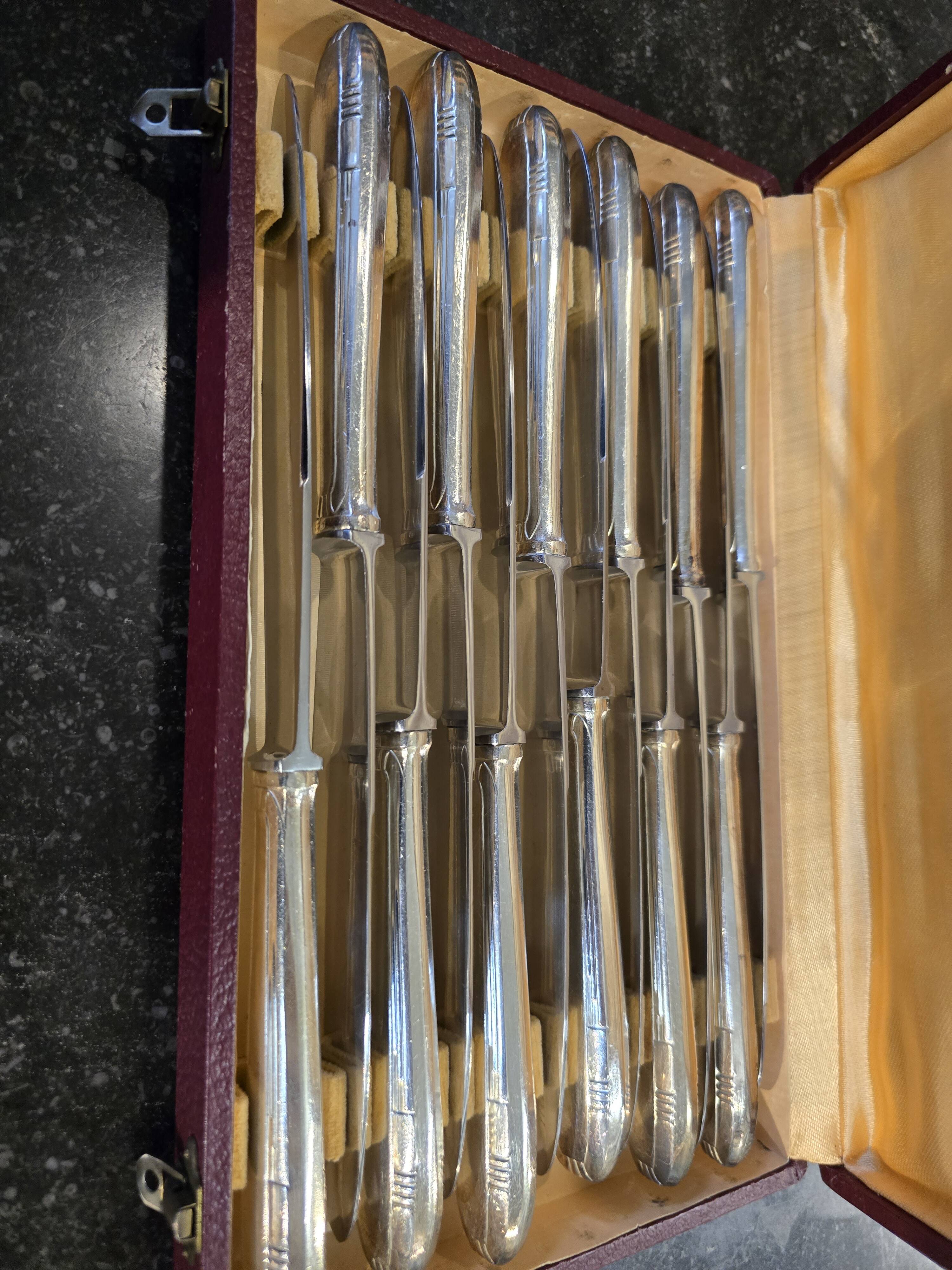 12 Art Deco knives in silver metal mid-20th century with its box