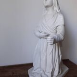 Religious statue of Saint Bernadette