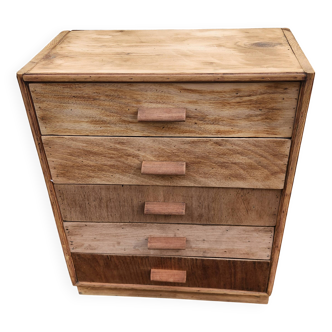 Old wooden furniture with 5 drawers made from an advertising box.