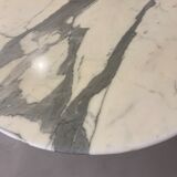 Oval marble dining table with iron base